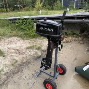 Trolley for transporting and storing a boat motor
